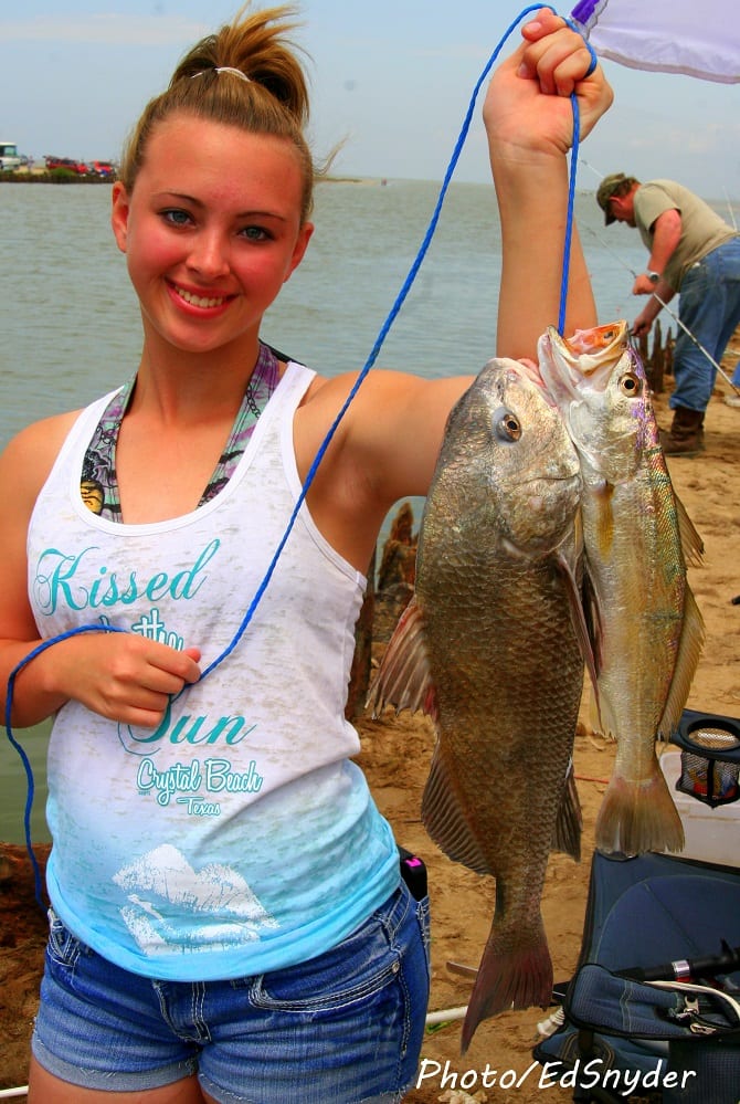  - IMG_0278-Jalyn-Morrison-of-Hemphill-TX-hefts-her-drum-and-sand-trout-she-caught-on-shrimp-