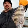 IMG_5540- Chris Whitell of Houston put this nice sheepshead on ice-