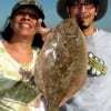 IMG_5756- The Martinez familia of Houston nabbed this 19inch flounder on live croaker-