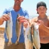 Ed and Noah Dain of Splendora surf caught these specks on #28 Mirror Lures.