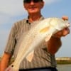 Ron Pullem of Huffman TX caught and released this nice red.