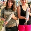 Sisters Cierra and Misty Garrison of Lumberton, TX caught these nice specks on shad.