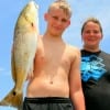 Mom and Son Jessica and Dylan Lee of Sheppard, TX took this nice red on finger mullet.