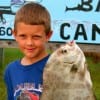 Tommy Norman of Hampshire TX hefts a HUGE angel fish caught on shrimp.