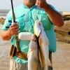 San Augustine TX angler Mark Birdwell surf waded for these nice speck and red fishing a mirror lure