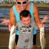 Becky (MOM) Godfrey with son Jacob hefting SUPPER.