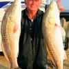 IFrank Bunyard of Tarkington Prairrie, TX took these two reds on finger mullet.