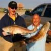 Margarigo Rosario and Arnold Camino of Channel View, TX tabled these nice reds on finger mullet.