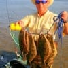 Kayaker Dennis Fraizer of Hampshire, TX took this limit of flounder on Berkley Gulp.