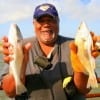 Reverand Haywood of Community Baptist Houston nabbed up these 13 and 14inch croaker for his church fish fry.