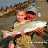 Seasoned angler 6yr old Julian Ballard of Labell, TX wrangled this 24inch red from Rollover fishing live shrimp.