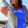 Keeper Speck to Kim Arnold of Lufkin, TX fishing with a finger mullet.