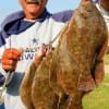 Henri Fontenot of Dallas fished Gulp swim baits to catch this 5 flounder limit.