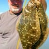 Conroe Angler John Nelson massaged Berkley Gulps across rollover structier to catch these two nice flounder.