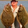 IMG_9517- George Parkman of Cypress TX took this 24 and 20inch flounder on a jig n'minnow rig-