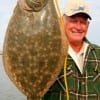 I am smiling stupid Frank Bunyard quiped after catching this 21 inch flounder.