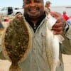 George Merritt of Pasadena, TX nabbed this nice speck and flounder on finger mullet.