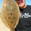 John Bernardini of Baytown, TX nabbed this keeper flounder on a mud minnow.