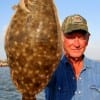 Trakington Prairrie TX angler Frank Bunyard landed this nice flounder on berkley gulp.