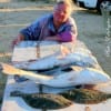 Tuckered out Isa Holland of Houston tabled this load of reds, drum, and flounder she caught on shrimp.