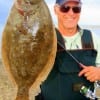 Former Marine Capt Hollis Gaston of Crystal Beach TX wade-fished with berkley gulp to catch this 20inch flounder.