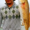 A 28inch slot red was caught by Henry Loi of Pasadena TX while fishing shrimp.