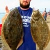 IMG_0215- Brandon Sherrod of Crocket TX took this 21 and 20inch flatfish using finger mullet-