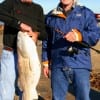 Fishin buds Dale Patterson and Dwayne Rosson of Ft. Worth, TX tackled this 38 inch tagger red on a Miss Nancy Mud Minnow.