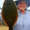 Pat LaCoste of katy TX,  caught this nice 18inch flounder fishing a finger mullet.