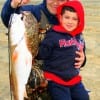 Father and son, Jose  Amezquita with 5yr old Victor show of dads red and sons very first catch a flounder, he caught on shrimp.