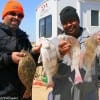 Brothers, Mike and  Kevin Hubbard of Cypress, TX had a good time catching drum and flounder at  the pass.