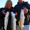 IMG_0451- Vicky Covey and Jim Redd of LaPort TX display Vicky's catch of the morning