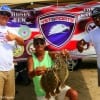 Vietnam combat Vet Henri Fontenot sahres his flounder catch with VetSports group.