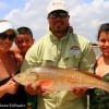 The Soriano familia of Houston gives a thumbs up for dads 30 inch tagger bull red.