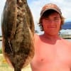 Dakota Gorden of Hardin TX wade-fished Rollover bay with mud minnows for these nice flounder.