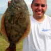 Mario Garza of Katy TX fished a miss nancy finger mullet for this nice flounder.