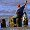 West side surf angler loads his stringer with specks.