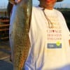 Karl Devers of Houston shows off his largest speck he caught on finger mullet.