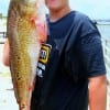 Desert Rat Don trussell of Turlinqua, TX took this tagger bull red on squid.