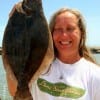 Carol Corfin of Manfield TX will be dining on Flounder this evening after fishing with finger mullet