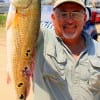 Former Marine Margarito Rolsales of Channelview TX fished a Miss Nancy finger mullet for this 29 inch tagger bull red