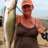 Silsbee TX anglerette Darlene Keen took this 23 inch trophy trout on a mirror lure while wade fishing the surf