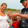 The Bouton Family of Conroe show off their YUKYUK catch -a toad fish- they caught on shrimp