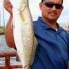 Armando Calderon of Dickinson TX took this nice speck on a live croaker