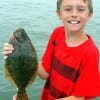 Nice keeper flounder for 10 yr old Casey Biscamp of Jasper TX caught on a finger mullet