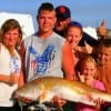 CATCH OF THE DAY!!!! The Louvier Family of Sour Lake TX surf-fished with live shrimp to take this HUGE 42 inch-25 lb Tagger Bull Redfish