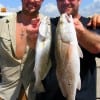 Father and Son, Tyler and Travis Reynolds of OK nabbed this nice trout and red on finger mullet