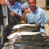 Father and Son, Wade and Blake Moore of Lufkin TX waded the early surf with T-28's to catch these impressive trout and reds